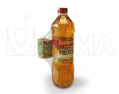 Opakowania promocyjne z butelką oleju i octu, pakowane w polietylenową folię termokurczliwą.