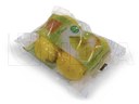 Cytryny pakowane bez tacki na poziomej maszynie pakującej.