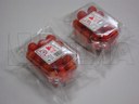 Pomidory koktajlowe na tacce pakowane na poziomej maszynie pakującej (HFFS).