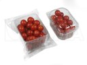 Pomidory malinowe pakowane na tacce na poziomej maszynie pakującej (HFFS).