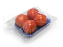 Pomidory pakowane na tacce  na poziomej maszynie pakującej (HFFS).